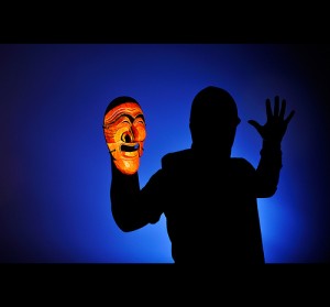 Day 75 - Man without a Face: photo credit - Michael Sharman shadow of a man holding a mask