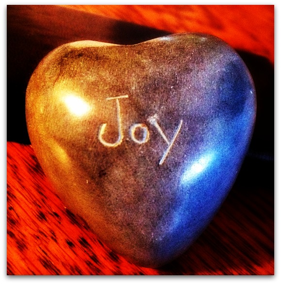Joyful Heart: photo credit - Sandi Amorim heart shaped stone etched with word joy