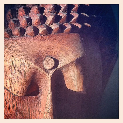 close up of wooden Buddha