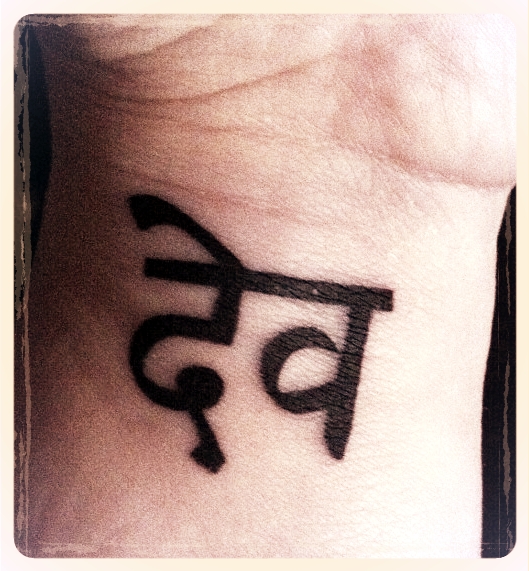 Marked, for Life: photo credit - Sandi Amorim wrist tattoo, Sanskrit for deva done by Bill Gaspari at Adrenaline in Vancouver, BC