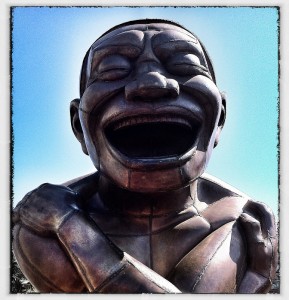 A-mazing Laughter, sculpture by Yue Minjun in Vancouver's English Bay