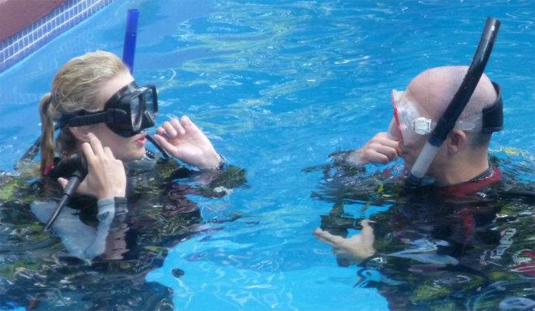 First Breath Jason Sugar of Breakthrough Adventures teaching scuba diving.