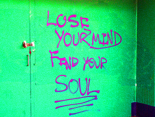 Lose and Find: photo credit - Len Matthews thoughtful words of challenge painted on the front wall of the old skate arena at Red Hill, Brisbane.